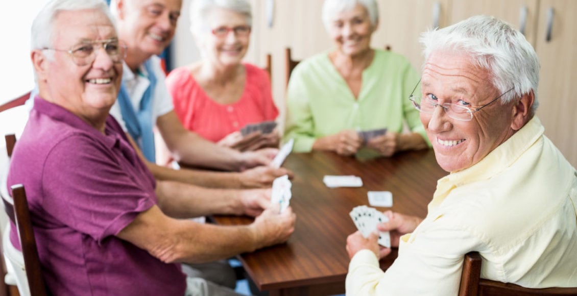 Seniors playing cards together