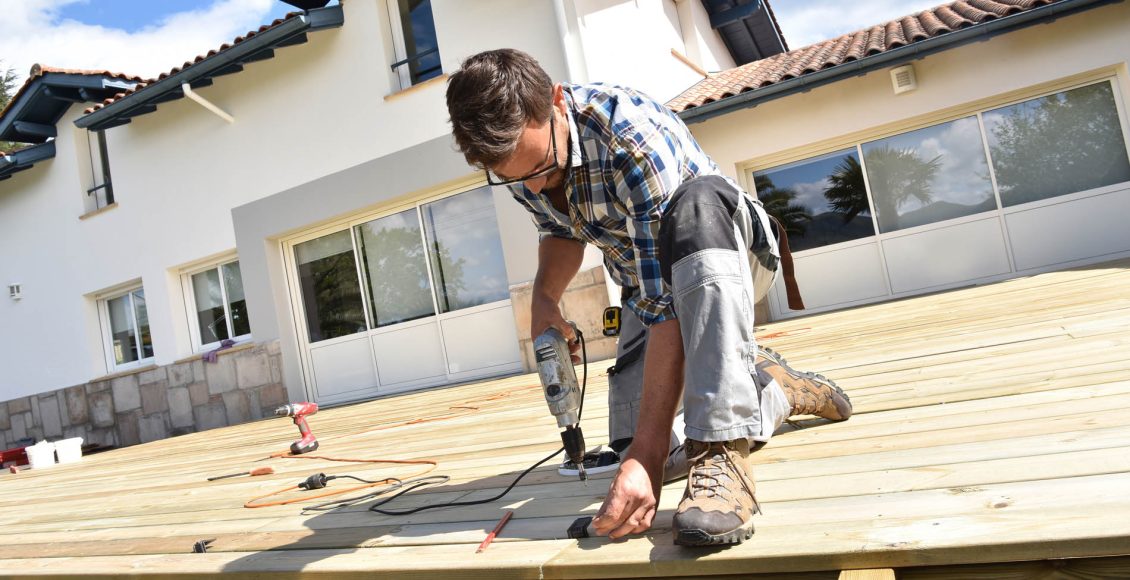 Carpenter building wooden deck